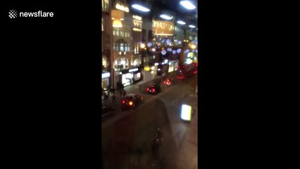Top shot of commuters fleeing Oxford Circus incident