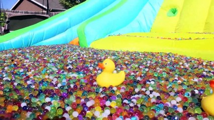 ONE MILLION ORBEEZ BATH! EPIC WATER SLIDE POOL - KID SUMMER FUN!! | Superheroes | Spiderman | Superman | Frozen Elsa | Joker