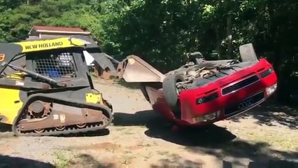 'When a dad has to prove a point' Digger smashes up Audi'