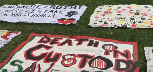 Father of Aborigine Who Died in Custody Sits Bowed in Silent Reflection Before Protest