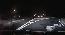 Manchester Police Officer Rolls Away to Avoid Collision With Passing Vehicle
