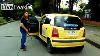 Female Taxi Driver Uses Machete