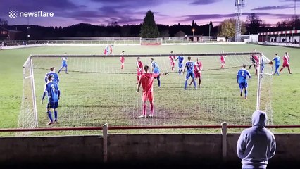 Have it! Player volleys ball out of ground