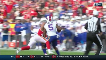 Tyrod Taylor tries to stiff arm Daniel Sorensen; it doesn't work