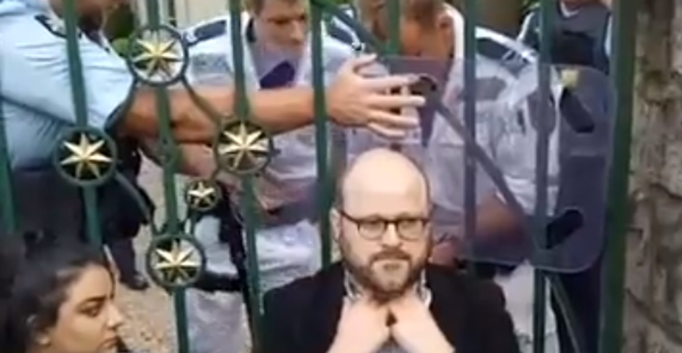 Police Remove Immigration Activists Chained to Gate of Australia PM's Residence