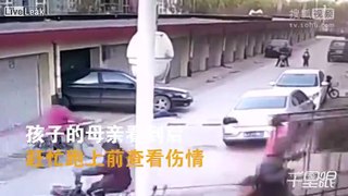 Child trips and falls under a car and gets ran over