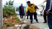Snake freed from manhole cover using cooking oil