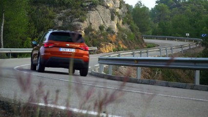 Seat Arona in Eclipse Orange Driving in the country