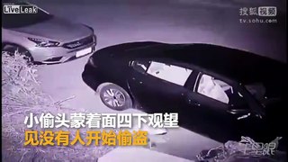 Thief uses a brick to break a cars window, only to bounce off and hit him in the face and shoulder