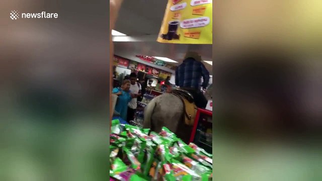 Cowboy rides into supermarket on his horse to buy beers