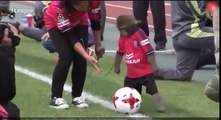 A monkey kicking off a football match in Japan is all you need to see today