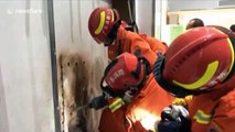 Firefighters rescue boy trapped between two walls
