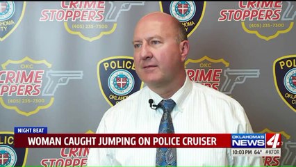 Woman Caught on Camera Jumping on Hood Police Car in Oklahoma City