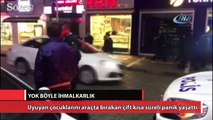 Uyuyan çocuklarını araçta bırakan çift kısa süreli panik yaşattı