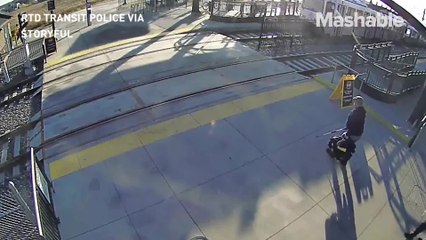 This blind man is saved from an oncoming train just in the nick of time
