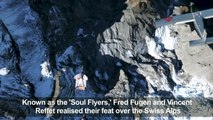 Wingsuit flyers jump into moving plane over the Swiss Alps