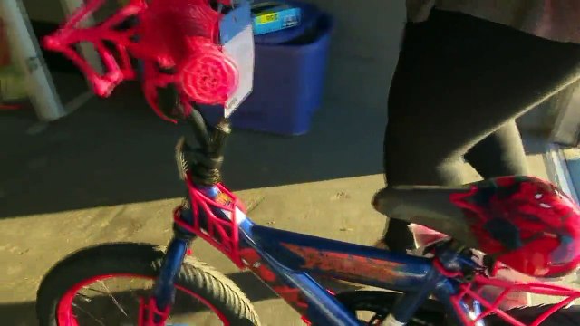 High School Band Filling Recovered Trailer with Toys, Goods to Donate to Others