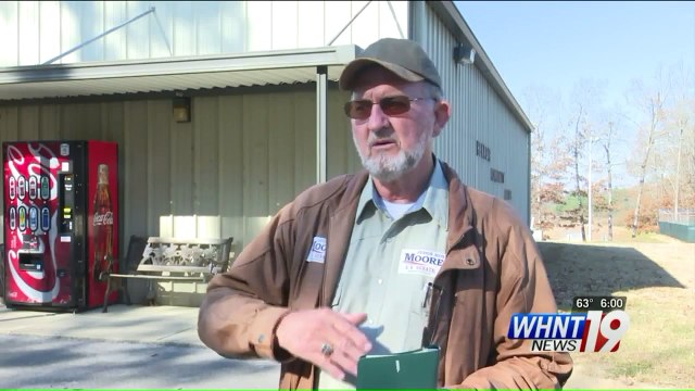 Roy Moore Campaign Official Scuffles with Photographer Outside Campaign Event