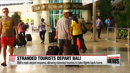 Bali Airport reopens after volcanic ash strands thousands
