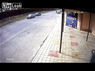 Lada drivers hits a pedestrian and almost crashes head on, then blames the pedestrian