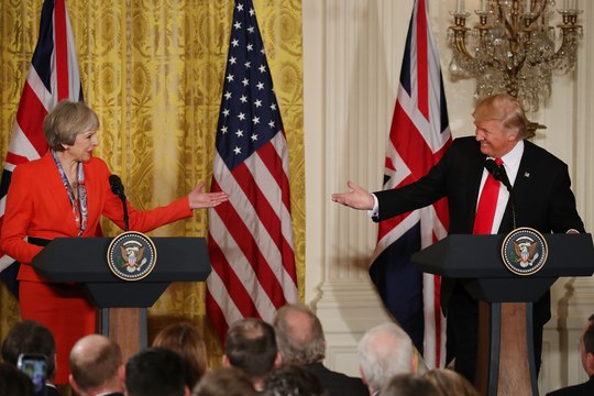 Trump attacks UK's Theresa May over far-right tweets