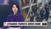 First Korean chartered flight brings home 180 Koreans stranded by Bali eruption