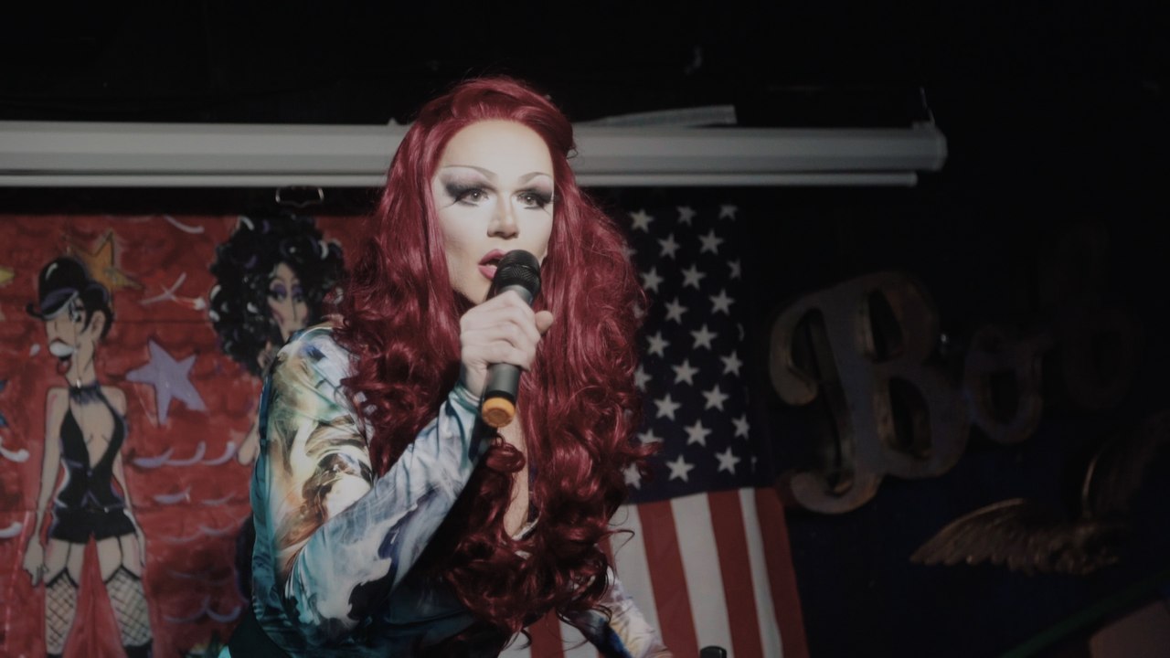 Watch this drag queen transform from day job to...