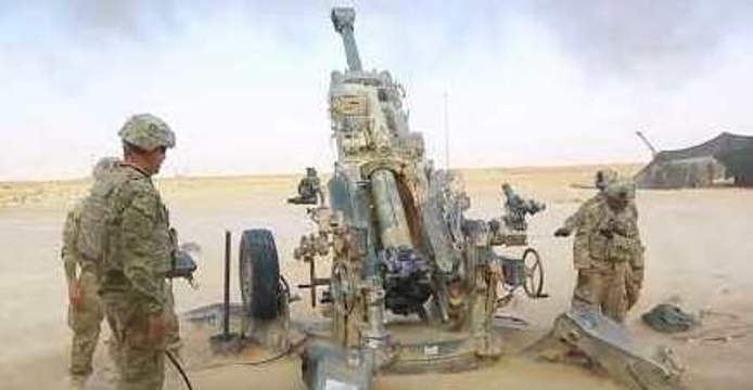 US Artillery Crew Seen Shelling Islamic State Positions Near Syrian Border