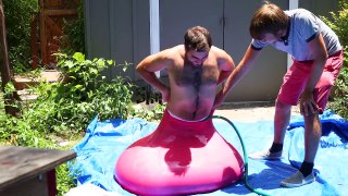 15.6ft Man in 6ft Giant Water Balloon - 4K - The Slow Mo Guys
