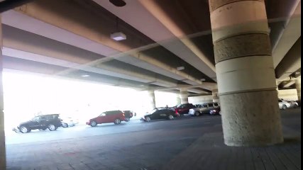 Truck flips over freeway second view