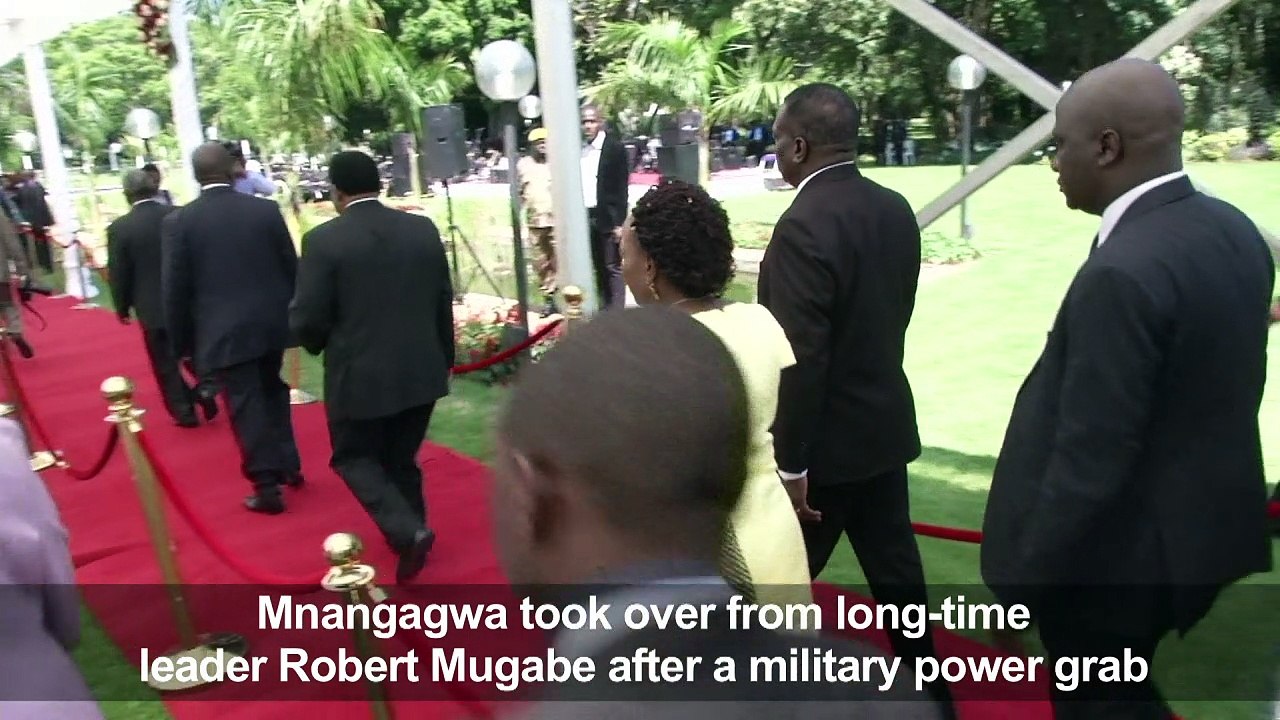 Zimbabwe president swears in new government