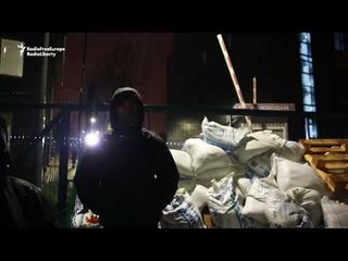 Men in Balaclavas Blockade TV Station in Kiev