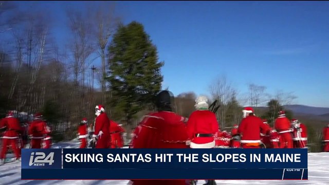 i24NEWS DESK | Skiing Santas hit the slopes in Maine | Monday, December 4th 2017
