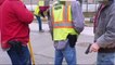 Photo Shows Construction Workers Holding Guns Allegedly by School