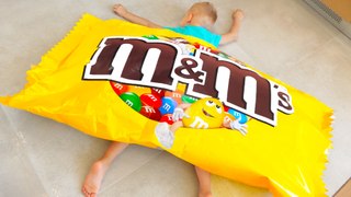 Funny Baby and Giant Candy  M&M's Challenge