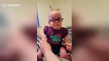 Triplet baby born at 25 weeks sees clearly for first time with glasses