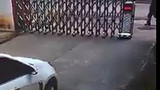 Woman gets pinned between to cars after an accident