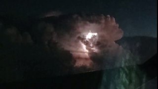 Crazy Lightning Storm at 39,000 Feet