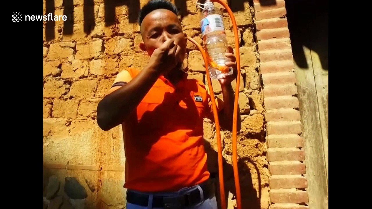This Chinese man can drink through his ears