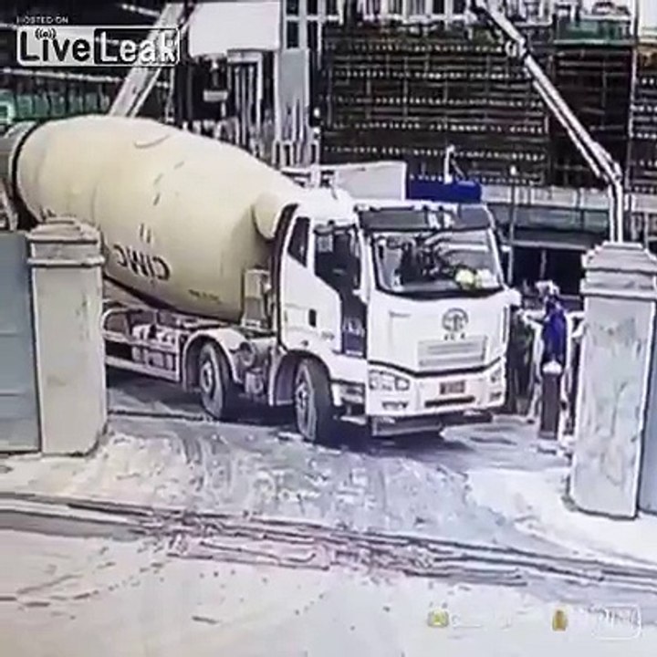 Cement truck falls down in a big hole