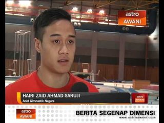 Dua atlet gimnastik pulau sesi latihan