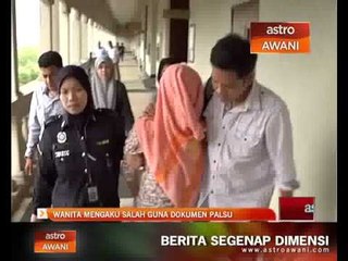 Wanita mengaku salah guna dokumen palsu
