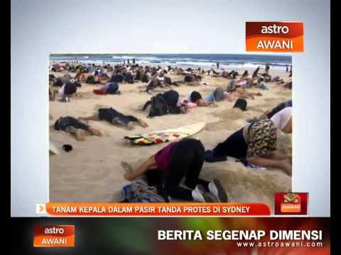 Tanam kepala dalam pasir tanda protes di Sydney