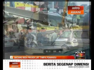 Pemandu nyaris maut, batang besi projek LRT timpa kereta