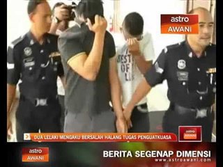 Скачать видео: Dua lelaki mengaku bersalah halang tugas penguatkuasa