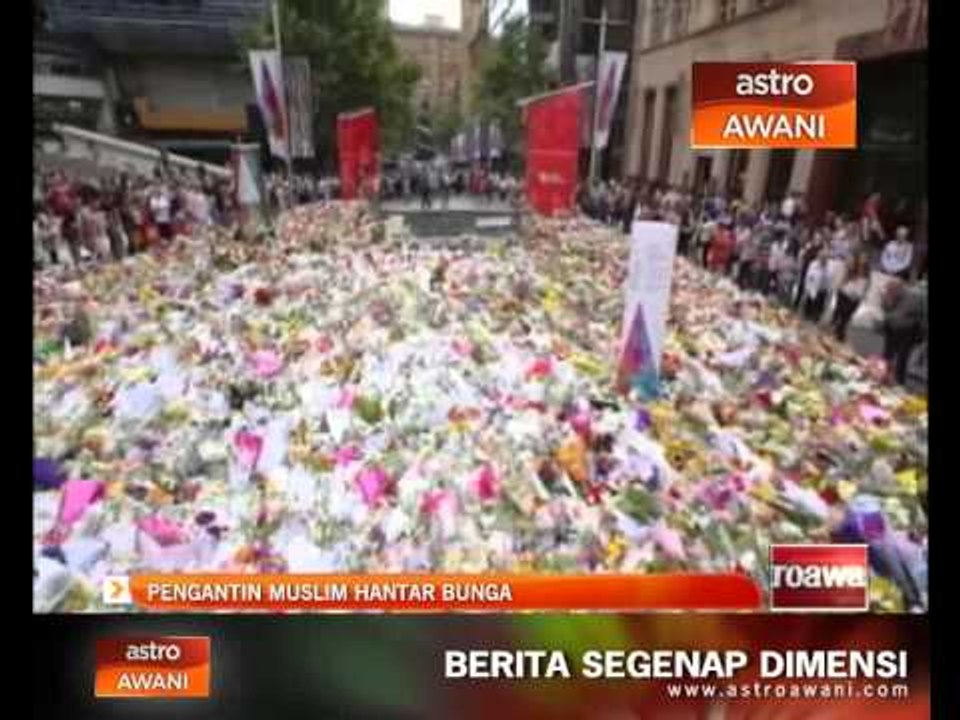 Pengantin muslim letak bunga di tapak Sydney Siege