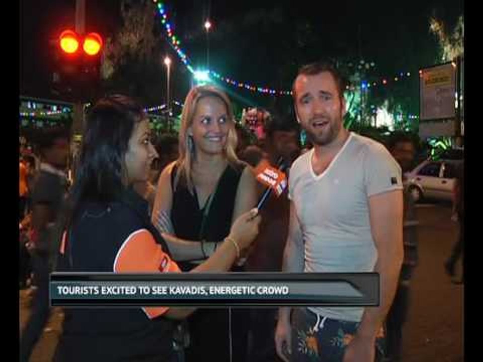 Tourists excited to see Kavadis, energetic crowd