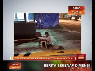 Foto budak gelandangan belajar tepi jalan jadi viral