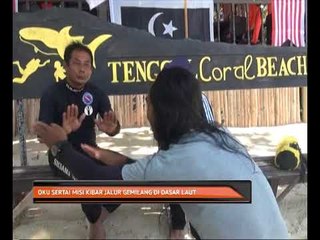 OKU sertai misi kibar Jalur Gemilang di dasar laut