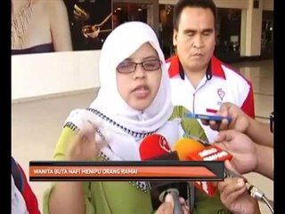 Wanita buta nafi menipu orang ramai